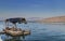 Primitive boat or raft on a mussel farm in Saranda, Albania. Fresh ecological seafood