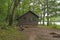 Primitive Cabin on a Forested Lakeshore