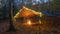 Primitive Tarp Shelter with campfire and fairy lights. Survival Bushcraft setup in the Blue Ridge Mountains near Asheville. During