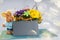 Primroses on a white stepladder as easter decoration