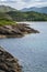 Prince`s Cairn, Lake Nan Uamh, picturesque bay in Scotland, UK