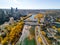 Princes Island Park Peace Bridge autumn foliage scenery. Aerial view of Downtown City of Calgary