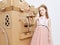 The princess play with cardboard castle tower.