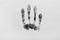 Print of hand and fingers on white, top view. Criminal investigation