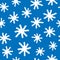 Print with snowflakes drawn by hand with rough brush. Winter seamless pattern.