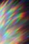 Prism colored rainbow light blurred background