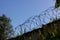 Prison barbed wire. Prison fence. Strict punishment for crimes