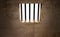 Prison cell, inside a prison cell. Window of a penitentiary. Shadows projected on the ground. Prison sentence, window bars.