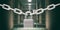 Prison safety. Locked metal chain with padlock against blurred jail bars, corridor and cells background. 3d illustration