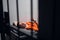 A prisoner lies on a bunk in a prison cell and shows the victory gesture with his fingers.