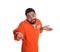 Prisoner in special jumpsuit perplexedly shrugging his shoulders on white background