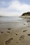 Pristine Coastal sandy beach with footprints