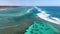 Pristine Coral Reef in turquoise water seen from above. Top down aerial footage. Ningaloo Reef, Australian tourism.