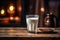 a pristine glass of milk on a charming wooden table.