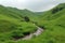 pristine green hills with rolling streams, and the sound of birds chirping