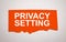 PRIVACY SETTING text on red torn paper