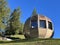 A private accommodation unit in the form of a large wooden ball or a glamping bungalow with a sauna by an alpine lake, Davos Dorf