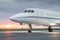 Private business jet with sunrise