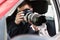 Private Detective Photographing With Slr Camera