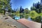 Private dock with boats and patio area with rustic table