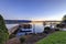 Private dock with jet ski lifts and covered boat lift, Lake Washington.