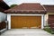 Private garage with barrier, wooden gate