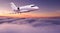 Private jet plane flying above clouds in beautiful sunset.