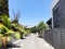 Private modern houses and palm trees on the streets in Rishon Le Zion, Israel