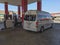 Private and public vehicles llne up to fill up gas at Al Khaleej petrol station at Makkah-Medinah highway, Saudi Arabia.