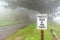 Private road sign in fog