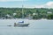 A private sailboat towing a dinghy on Skurusundet river