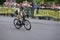 Pro Cyclist Completes Turn At Uptown Criterium