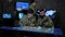 Pro soldiers in uniform, view digital tablet and working in laptop, at briefing, in military base, discussing assault,