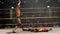 Pro Wrestling Match Sequence - Wrestler Superkicks Opponent in Face