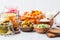 Probiotics food concept. Kimchi, beet sauerkraut, sauerkraut, cottage cheese, peas, olives, bread, chocolate, kefir and pickled