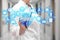 Probiotics on the touch screen with icons on the medicine background blur Doctor in