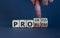 Problem or progress symbol. Businessman hand turns wooden cubes and changes the word `problem` to `progress`. Beautiful grey