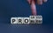 Problem or progress symbol. Businessman hand turns wooden cubes and changes the word `problem` to `progress`. Beautiful grey