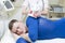 The procedure of lipomassage in a beauty salon