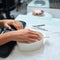 Procedure moisturizing nail, hand lay in the bath with water