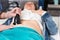 Procedure of RF lifting of abdomen skin of elderly female patient