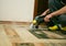 The process of cleaning carpets with a steam vacuum cleaner.