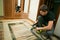 The process of cleaning carpets with a steam vacuum cleaner.