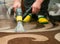 The process of cleaning carpets with a steam vacuum cleaner.