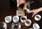 The process of coffee cupping. Coffee is poured into tasting cups