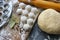 The process of cooking homemade dumplings. Homemade raw ravioli on a wooden Board. The dumpling making.