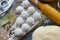 The process of cooking homemade dumplings. Homemade raw ravioli on a wooden Board. The dumpling making.