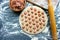 The process of cooking homemade dumplings. Homemade raw ravioli on a wooden Board. The dumpling making.