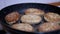 Process of Cooking Juicy, Fried, Brown-Crust Cutlets in a Fry Pan on Kitchen