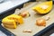 The process of cooking pumpkin for baking. Vegetables on a pan for baking.